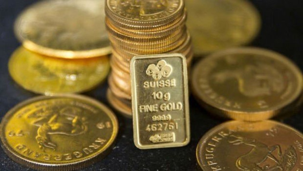 Altın Fed tutanakları öncesi kazançlarını korudu